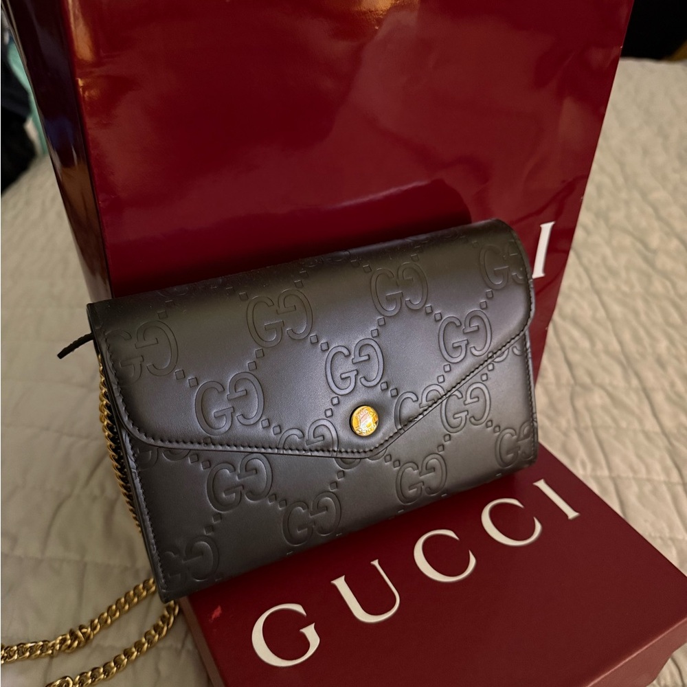 Gucci Black Embossed GG Clutch with Gold Chain